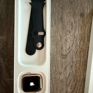 Apple Watch with Black Band and Gold Case
